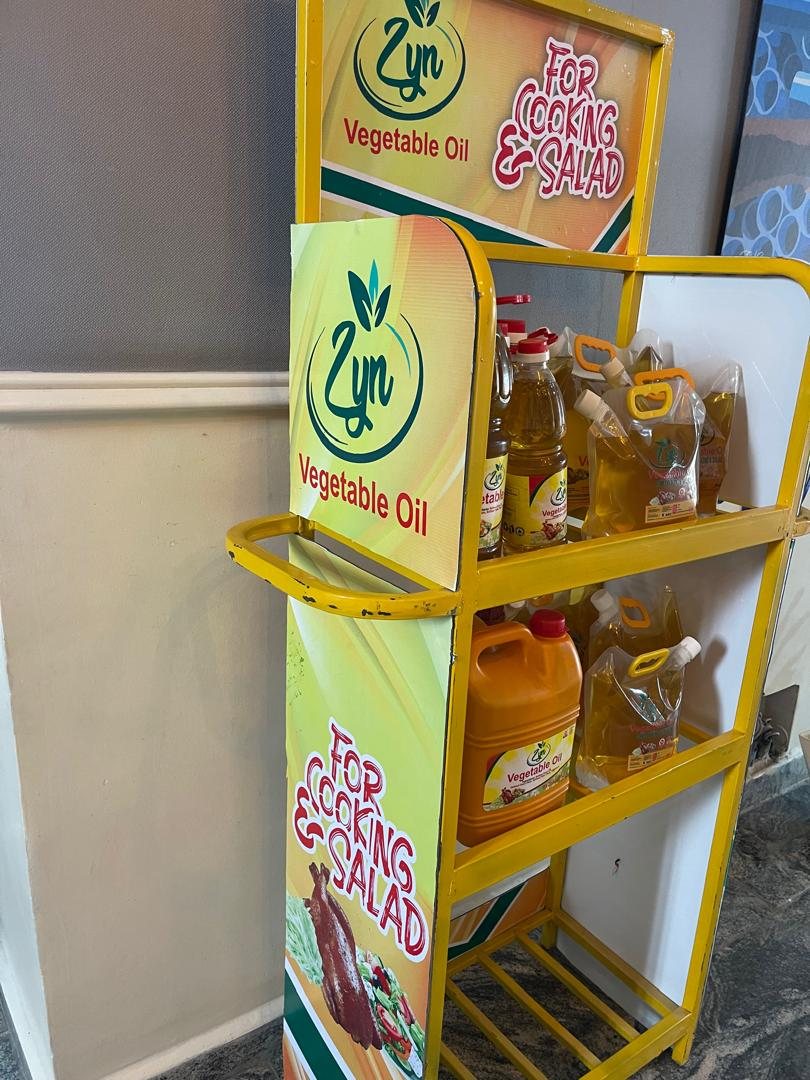 The Zyn Vegetable Oil stand seen at an angle against a wall, fully stocked.