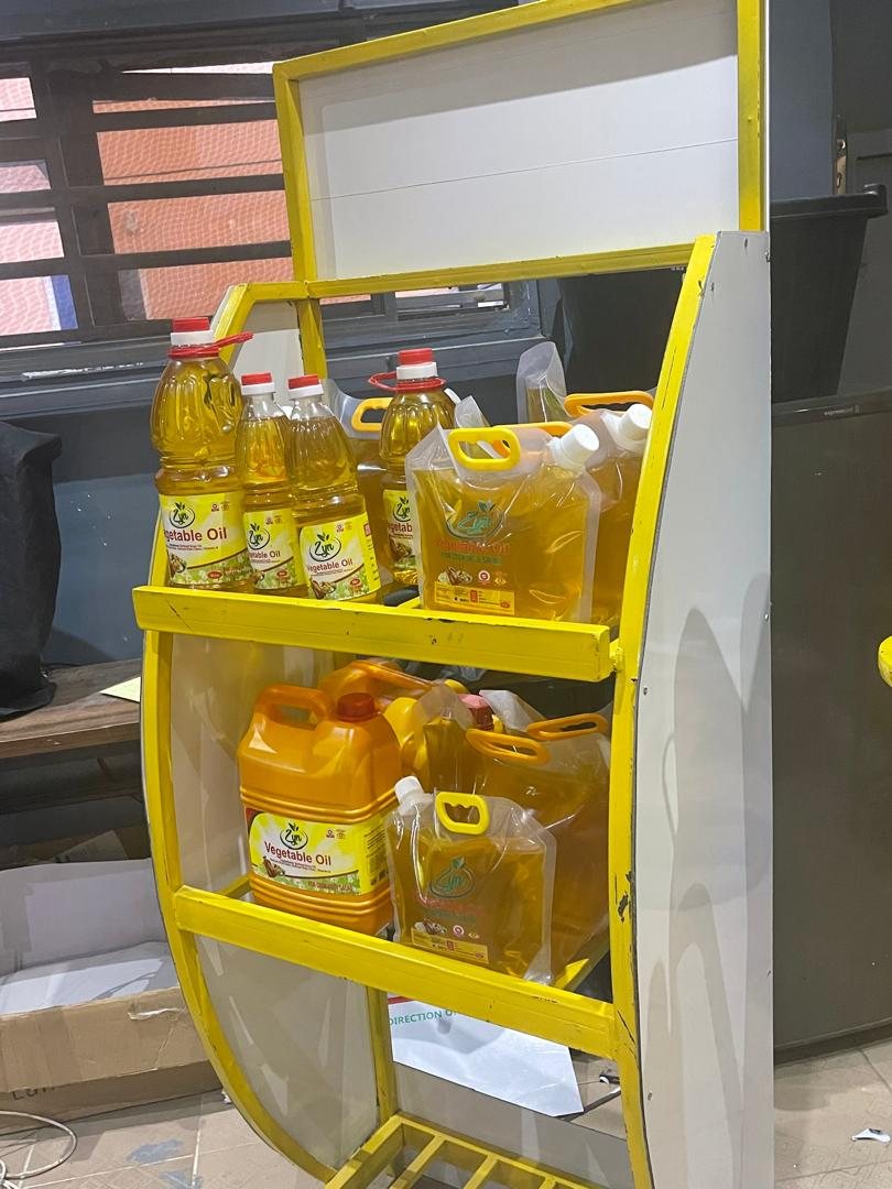The Zyn Vegetable Oil stand being loaded with product inside the workshop.