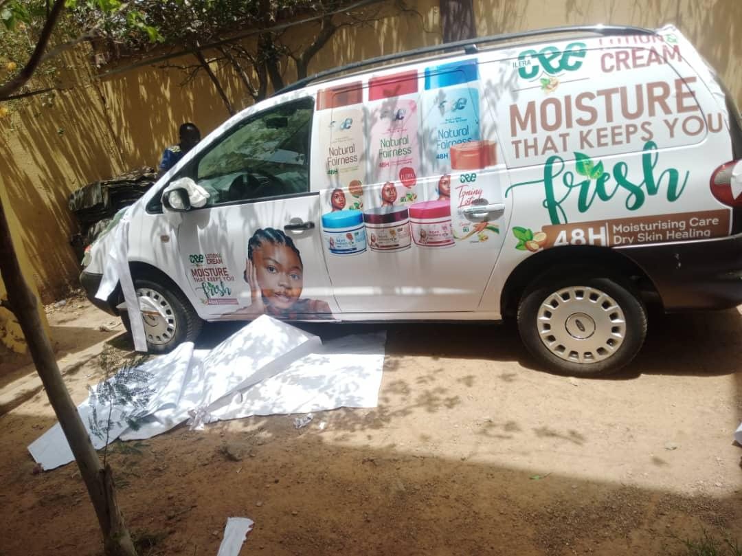 A white van wrapped with CEE Lotion and Cream product shots and the Moisture line.